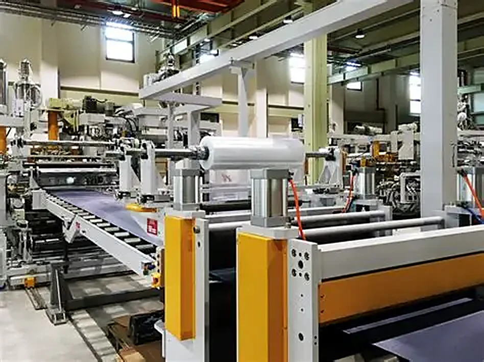 Panel extrusion line with staged material at a luggage factory